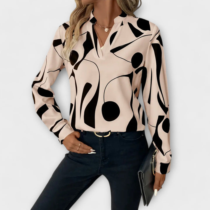 Elegantiška blusa su ilgomis rankovėmis