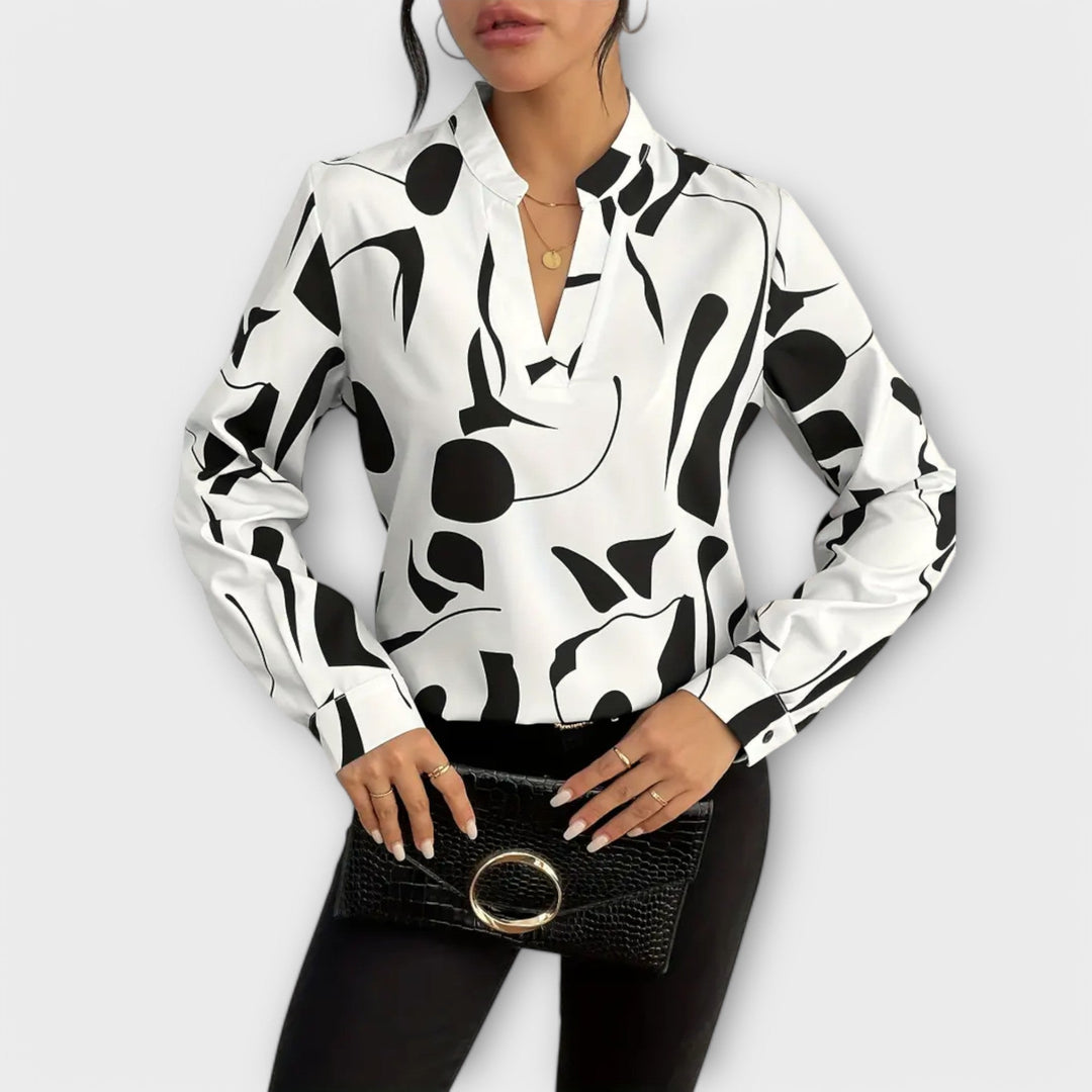 Elegantiška blusa su ilgomis rankovėmis