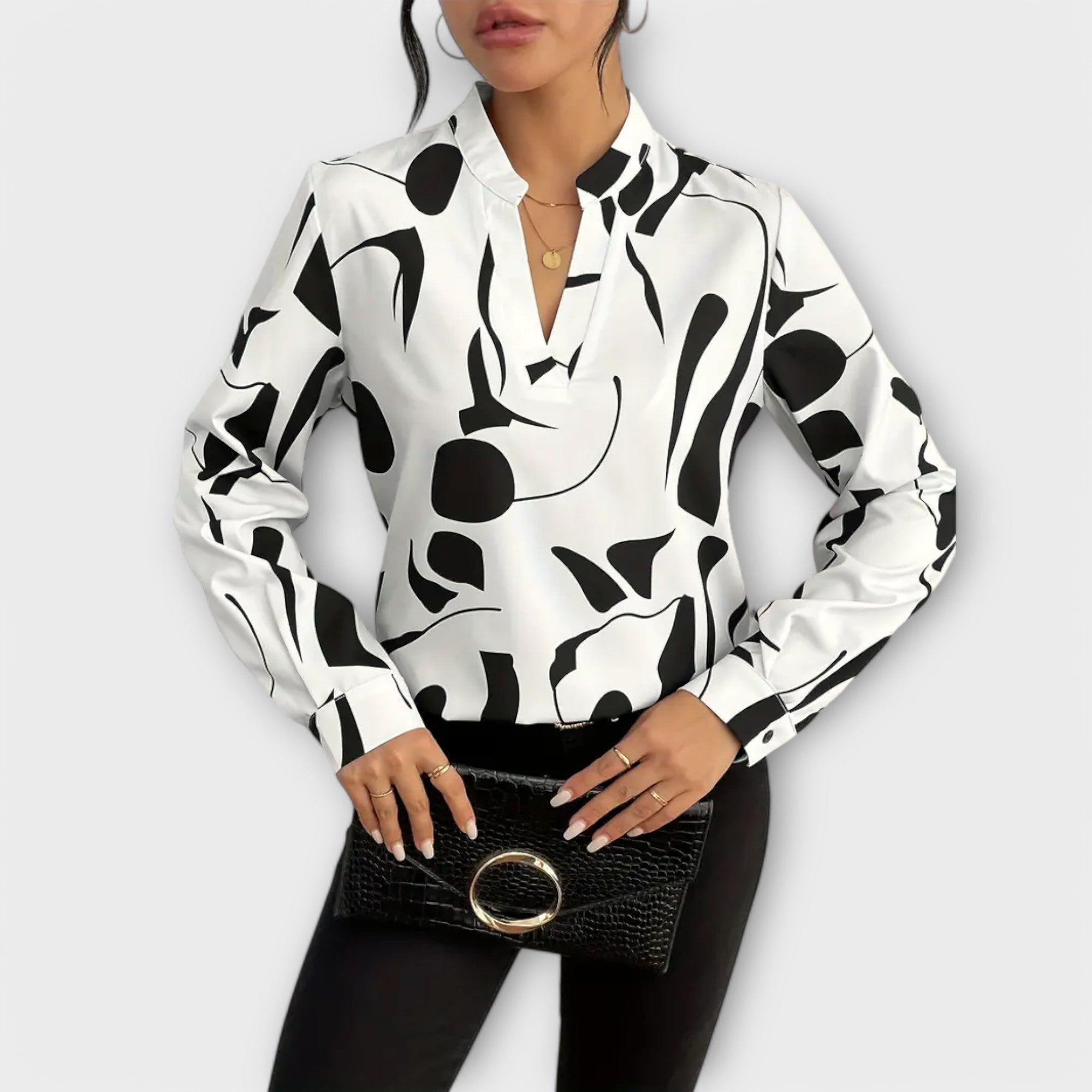 Elegantiška blusa su ilgomis rankovėmis